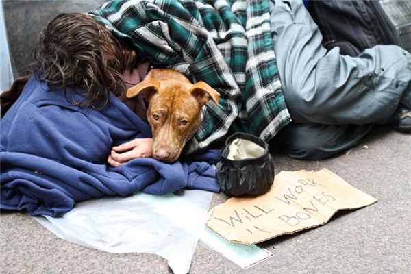 This man had to work just to get a bone for his dog to keep from starving.